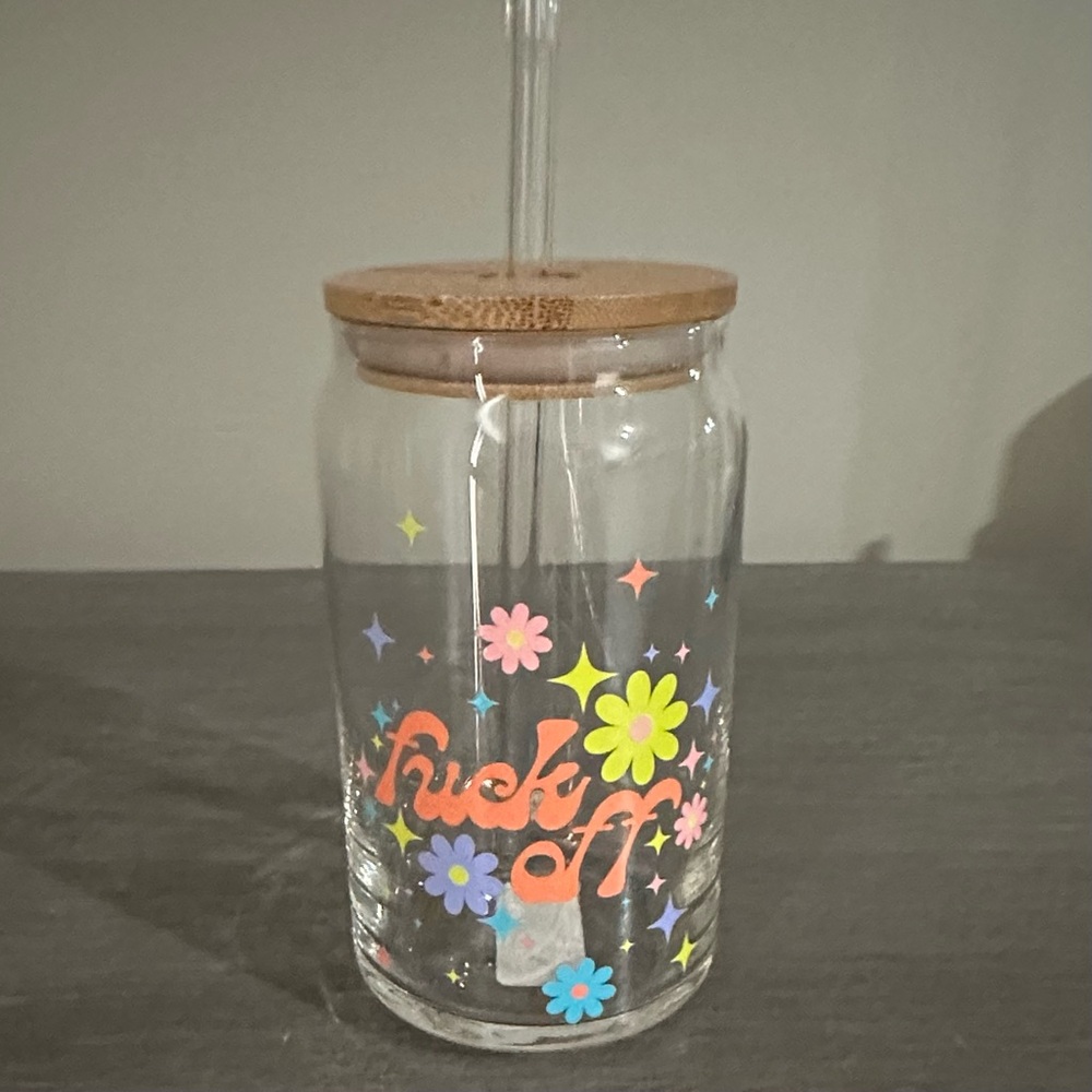 Cute glass cup with glass straw and wood top